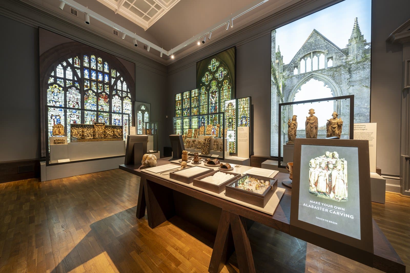 Gallery installation — full-wall printed graphics at exhibition scale